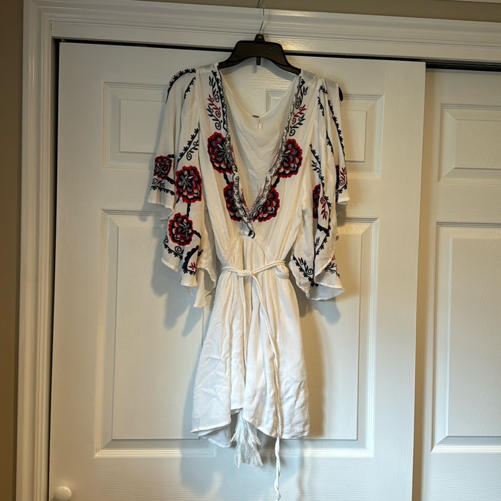 Flirty White Dress with flared sleeves